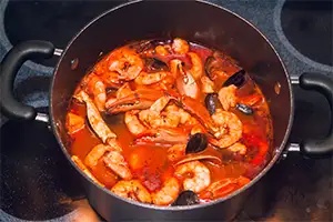 pot of bouillabaisse on stove